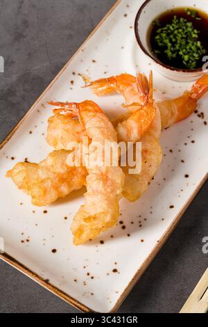 Crispy shrimp tempura served with soy dipping sauce Stock Photo