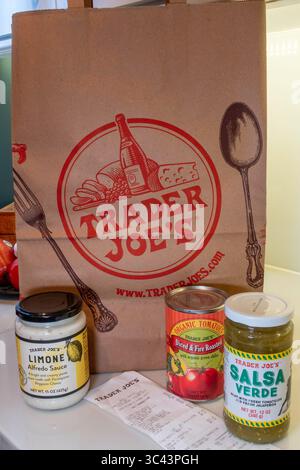 Kitchen counter with store brand products and Trader Joe's shopping bag,  USA  2025 Stock Photo