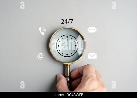 24-7 service support concept with communication icons and magnifying glass, nonstop customer care Stock Photo