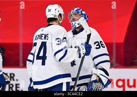 Toronto Maple Leafs center Jack Roslovic (96) moves the puck against ...