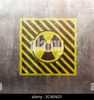 Radioactive sign on grey textured surface. Radiological pollution Stock Photo