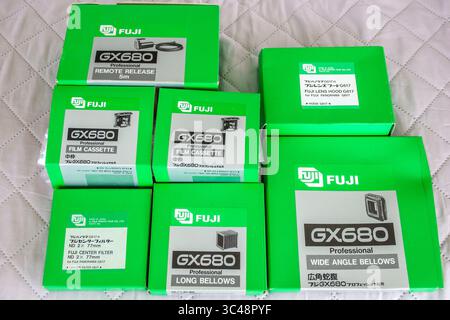 Miami Beach Florida,medium format film camera photography,assortment of boxed Fujifilm GX680 professional system accessories laid out on quilted white Stock Photo