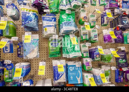 Miami Beach Florida,Collins Avenue,CVS Pharmacy drugstore,inside interior,display sale,retail pegboard wall filled with assorted dental care products, Stock Photo