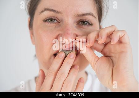 do women chew tobacco A Good Night for a Chaw Woman Uses Chewing Tobacco Stock