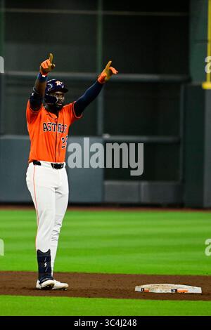 Houston Astros' Taylor Trammell celebrates as he runs the bases after