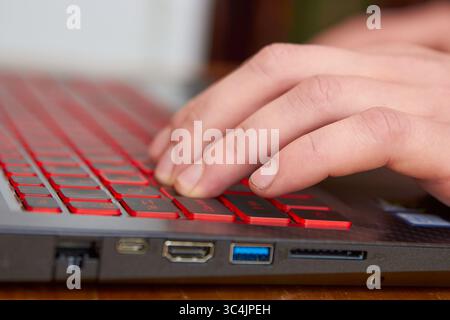 search for a job on the computer by pressing the keyboard keys Stock Photo
