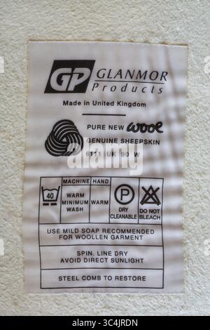 Pure new wool Made in United Kingdom label in coat - care washing ...