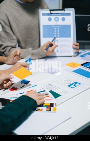 UX graphic designer planning application process development prototype wireframe for web smart phone. Creative digital development agency. Stock Photo