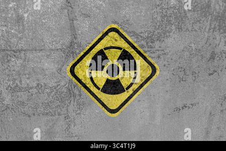 Radioactive sign on grey textured surface. Radiological pollution Stock Photo