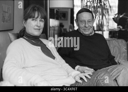 Mrs van Haasterk + Mr Bijl in connection with open-air theater, Bloemendaal, Bloemendaal, 23-03-1997 Whizgle News, Dutch Desk, The Netherlands, 1950-2000 A woman in a light sweater and a man in a dark pullover sit together on a couch, both looking at the camera with calm expressions in a cozy indoor setting. Stock Photo