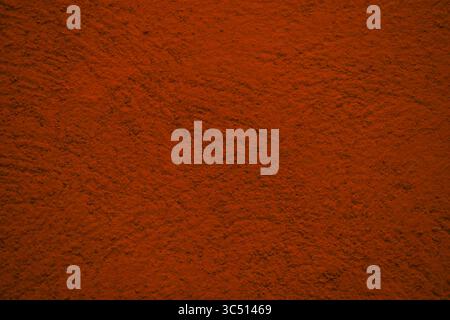 Embossed wall texture, saturated red background Stock Photo
