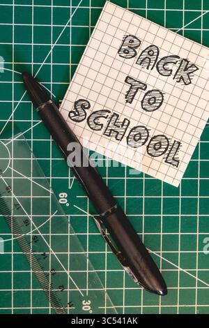 School supplies on a green background. Back To School background. Stock Photo