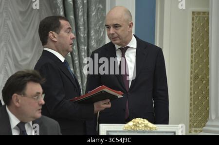December 25, 2019, Moscow, Russia: Russian Prime Minister Dmitry Medvedev, left, and First Deputy Prime Minister and Finance Minister Anton Siluanov before the year end meeting of the Council for Strategic Development and National Projects hosted by President Vladimir Putin at the Kremlin December 25, 2019 in Moscow, Russia. (Credit Image: © Aleksey Nikolskyi/Kremlin Pool/Planet Pix via ZUMA Wire) Stock Photo