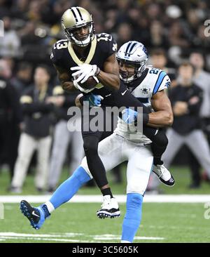 November 24, 2019, New Orleans, LA, USA: Carolina Panthers safety Eric Reid (25) brings down New Orleans Saints wide receiver Michael Thomas (13) after a reception on November 24, 2019, at the Mercedes-Benz Superdome in New Orleans. (Credit Image: © TNS via ZUMA Wire) Stock Photo