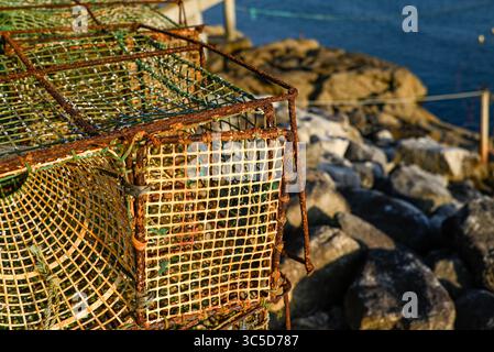 Industrial Fishing Cages by the Ocean Sustainable Fishing Traps in a Natural Setting Stock Photo