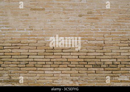 Tan brick wall texture background Stock Photo