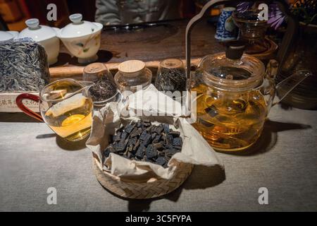Chinese tea ceremony attributes, tea jars and utensiles in China tea shop Stock Photo