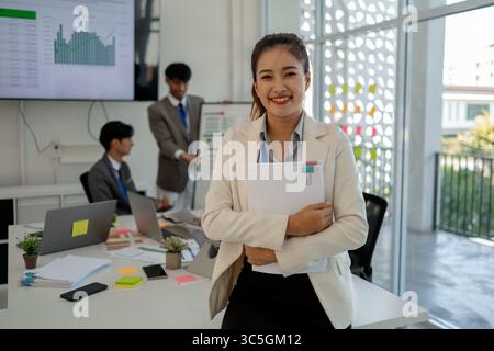 the atmosphere of the company's employees' meeting, businessmen brainstorming to increase the company's income, entrepreneur, marketing, finance, acco Stock Photo