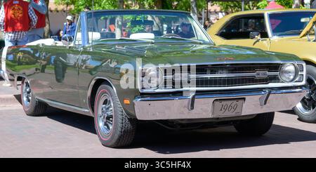 Santa Fe, NM, USA - May 16, 2025: Angled front view of 1969 Dodge Dart GTS parked along the Plaza in Downtown Santa Fe for a classic car show Stock Photo