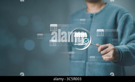 Woman using magnifying glass, find shop store for shopping online. E-commerce marketing business online. Internet Technology, online shopping, Stock Photo
