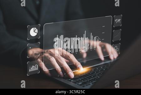 Financial data report graph concept. Businessman or Analyst using KPI dashboard on screen with business analytics and data management system of the co Stock Photo