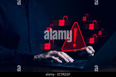 Cybersecurity concept. Hacker working on computer. Internet cyber crime, Digital crime by anonymous hacker, System hacked alert cyberattack, Compromis Stock Photo