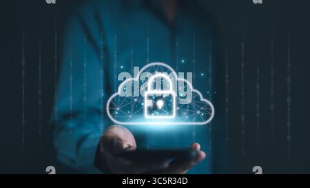 Cloud computing technology to database storage security concept. Man showing cloud with padlock icon on network connection. Cybersecurity and Internet Stock Photo