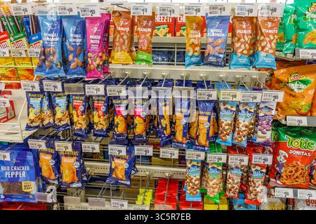 Miami Florida,7-Eleven convenience store,interior inside nut snack food section,Planters and Blue Diamond almonds,cashews,peanuts,mixed nuts,7-Select Stock Photo
