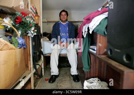 April 11, 2006, Huron, Ca, USA: HURON, CA- APRIL 12; Enrique (not his real name) , is a 35 year old undocumented farmworker from Mexico. To reach California, he paid a coyote $1200 and endured three straight days walking in the Arizona desert. His home, which was donated, is an overcrowded and moldy trailer. He is one of the lucky immigrants- others in town have to pay up to $400 a month for similar accomodations, with no running water or bathroom facilities. Although it is damp and cramped, he prefers the privacy over living in a shared room at the labor camps in town. About 39 percent of Hur Stock Photo