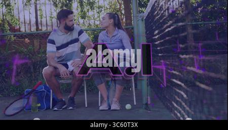 Sitting couple wearing athletic attire gripping towel, racket and ball on tennis court metal bench Stock Photo