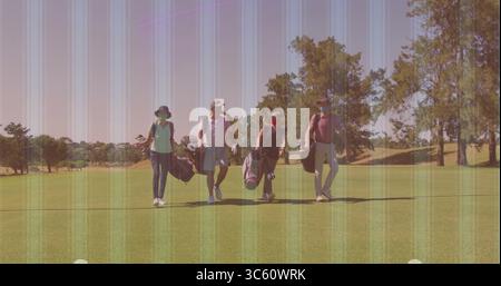 Walking four golfers carrying golf bags down golf course fairway, wearing caps, sunhat and gloves Stock Photo