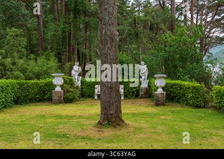 Landscape design manicured box hedge garden triangular arrangement ...