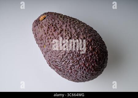 Green avocado raw  on white background view from above Stock Photo