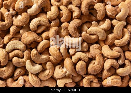 Full frame top view of huge amount of  roasted, salted cashew nuts Stock Photo
