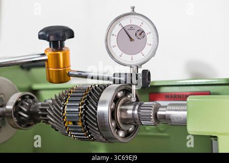 Closeup a shaft run-out measurement by yellow dial test indicator