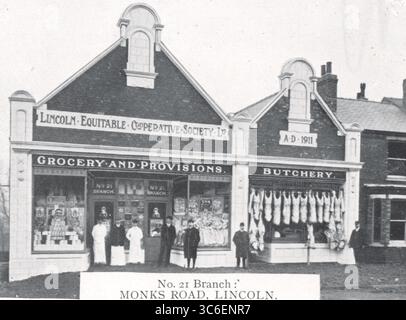 Shop front: The No. 21 branch of the Lincoln Co-Op Society which was in Monks Road, Lincoln. From a selection of printed photographs first published in 1911 by the Co-Operative Wholesale Society and relating to the fiftieth anniversary of the Co-Op in Lincoln. Stock Photo