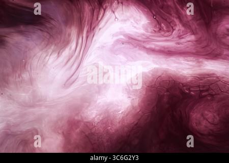 Abstract Liquid Flow in Soft Pink Tones. Organic liquid texture with swirling soft pink and white tones creating a dreamy abstract pattern. Stock Photo