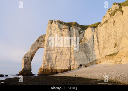 Cliff with the rock gate Falaise d'Aval and the rock needle Aiguille d ...