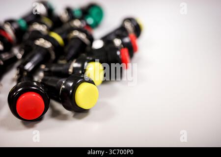 Electronic push buttons on white background Stock Photo