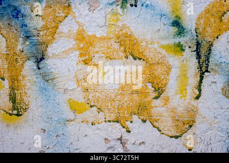 Grungy Shabby Uneven Solid Painted Plastered Facade Texture. Urban White Wash Old Brick Wall Background. Vintage Gray Retro Plaster Wall Structure. Stock Photo