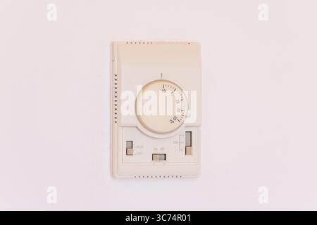Wall-mounted air conditioning control unit Stock Photo