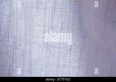 Close-up of white woven linen fabric texture Stock Photo