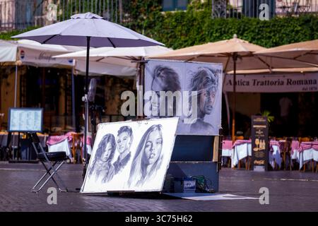 Portrait sketches created by a street artist, Rome, Italy Stock Photo