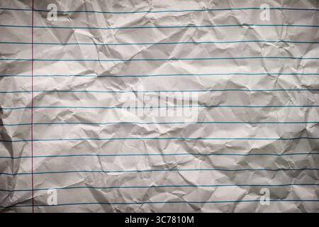 A background of crumpled lined paper. Close up. Stock Photo