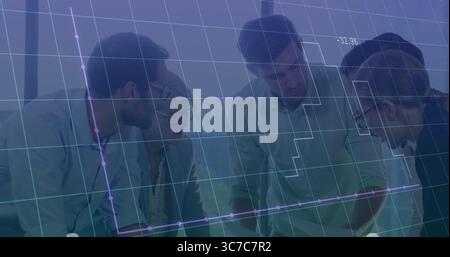 Business colleagues reviewing charts on laptop and discussing data in office, with grid overlay Stock Photo