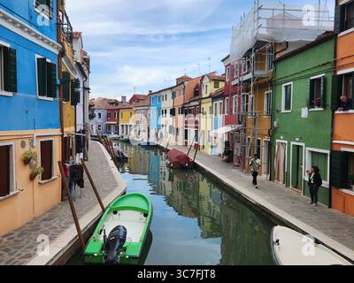 colourful houses next to canal burano venice Stock Photo
