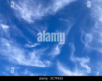 wispy cirrus clouds Stock Photo