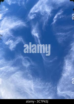 wispy cirrus clouds Stock Photo