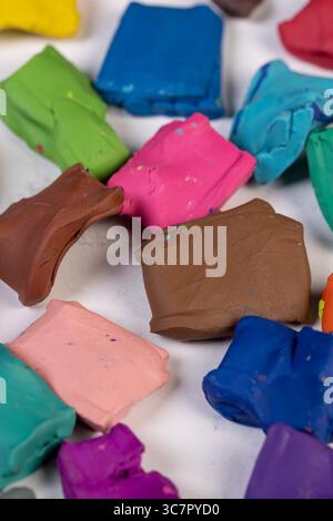 plasticine for modeling and initial creativity, plasticine in a box of different colors is used for creative work Stock Photo