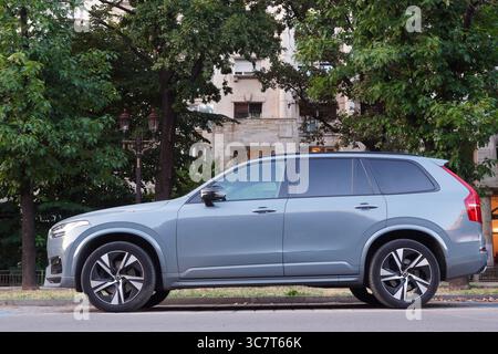 Bucharest, Romania – August 1, 2025: Closeup side view of Volvo XC90 B5 gray car parked on street in the city Stock Photo